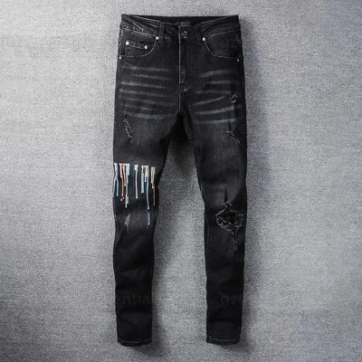 スポット春と秋のヨーロッパとアメリカのジーンズメンズストレッチスリムフィットパーソナライズロングパンツスプライシングリッピングレトロパッチパンツ|undefined
