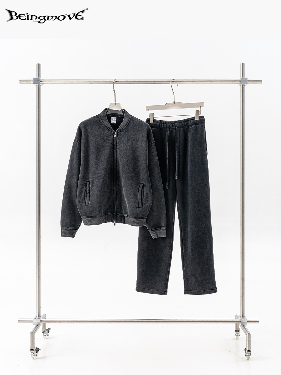 Conjunto de dos piezas de otoño e invierno 2025 de marca americana de diseño moderno, cárdigan con cremallera de gran tamaño y pantalones de chándal de pierna ancha para hombres.