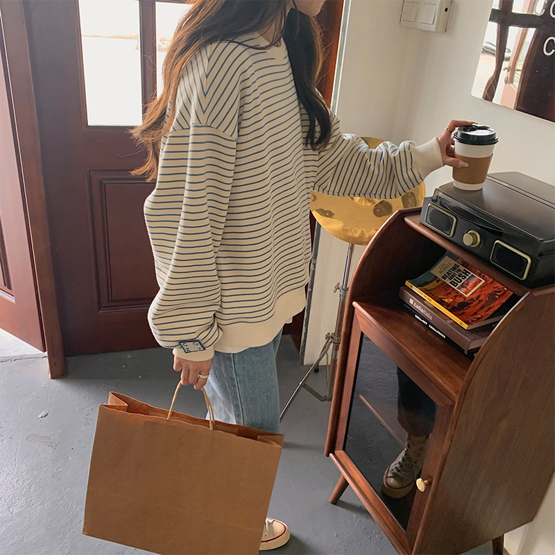 Selección estricta manga fuera del hombro suéter de manga larga a rayas diseño de nicho de las mujeres adelgazamiento Oversize primavera y verano transfronterizo Top Moda