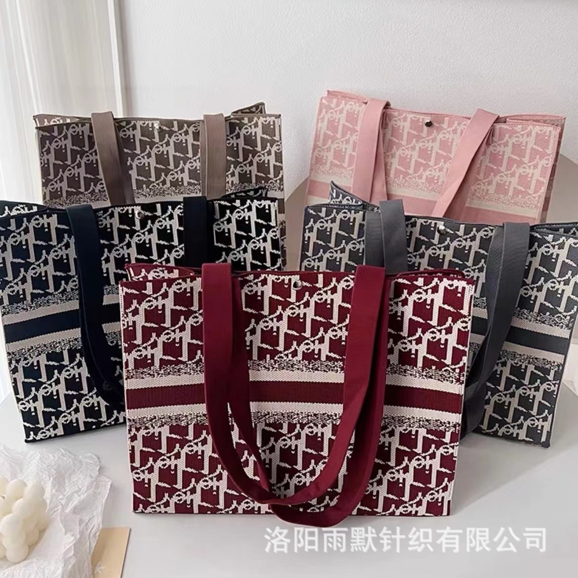 2025 bolso de hombro de pata de gallo rosa de alta calidad popular para mujer nuevo bolso portátil de punto de gran capacidad de moda