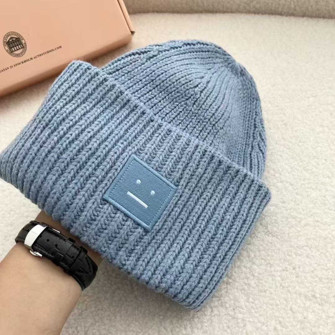 AC笑顔の帽子の四角のラベルを貼って、ウールの北欧風の冷たい帽子の韓国版のカップルの毛糸の帽子の高品質の冷たい帽子を巻きます。