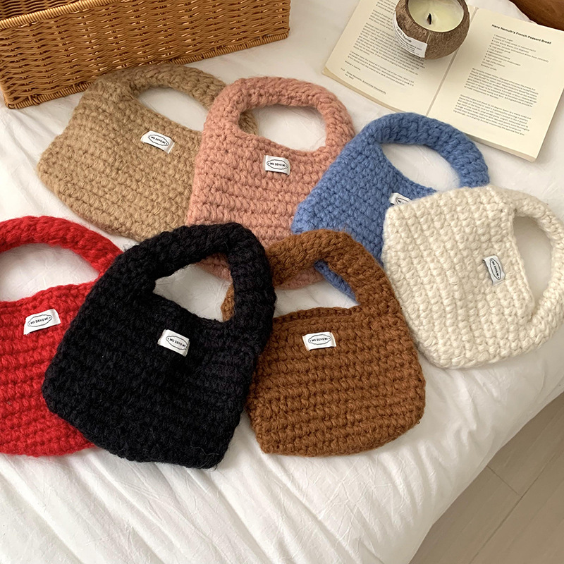 Sal de chicas diarias con bolsas de mano coreanas de color sólido, bolsas de color caramelo de alto nivel de invierno y otoño