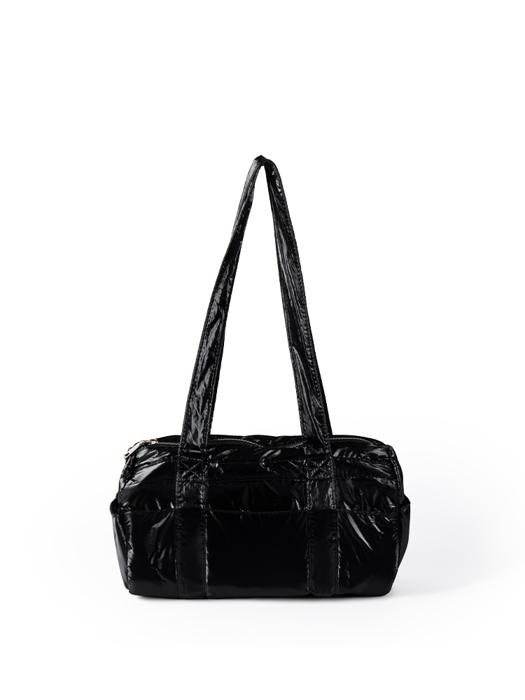 Corea del Sur nicho 2024 otoño e invierno nuevo estilo ligero y moderno bolso cilíndrico de un solo hombro todo fósforo simple bolso de axila mujer