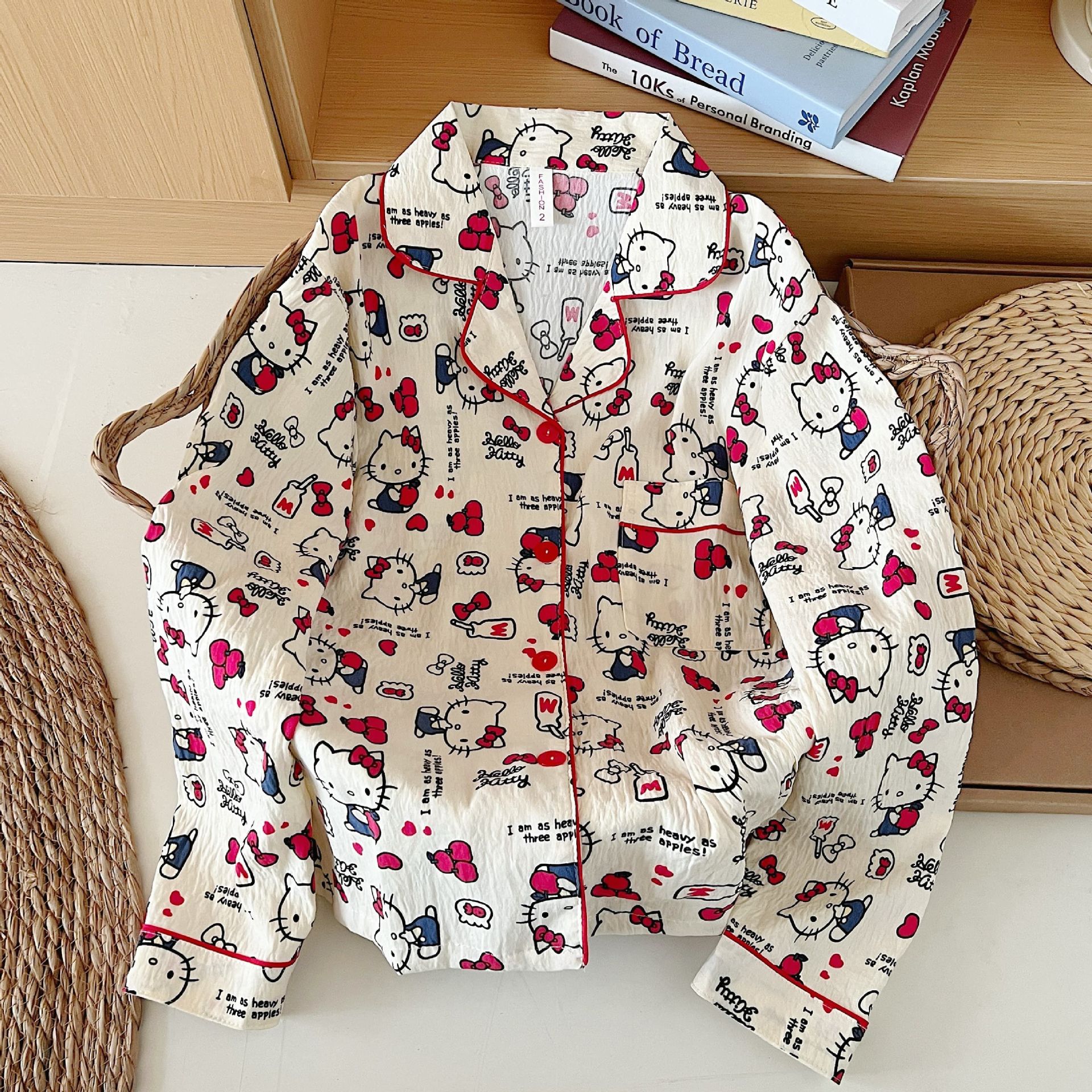 Al por mayor transfronterizo otoño nuevo 140 g nubes camiseta de algodón pijama de manga larga de dibujos animados TK gato ropa de hogar se puede usar fuera