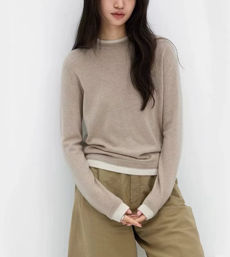 色の偽の2つの丸首のカシミヤのニットの底のシャツの女性の秋冬の怠惰な高級感の灰色のセーターの中で上着を掛けます。