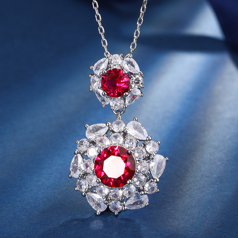 El otoño y el invierno Nueva Zhuang Sheng joyería de cobre inferior chapado en oro de simulación de corindón rojo temperamento redondo luz traje de lujo femenino 10mm7m