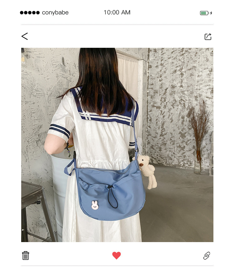 The new 2022 Little Bear canvas small bag for women is simple and versatile. The student dumpling bag is a trendy casual single-shoulder crossbody bag details Picture