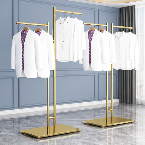 Clothing store display: freestanding island racks, men's and women's clothing racks, garment shelves, and kid's clothing hangers.