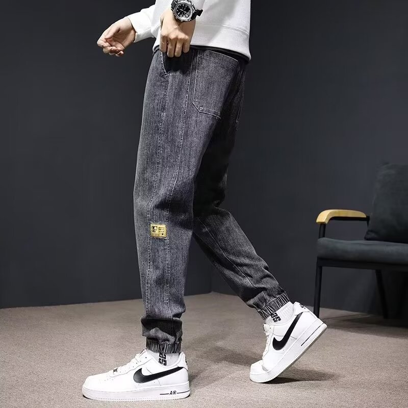 2024 primavera y otoño pantalones vaqueros de cintura elástica todo fósforo para hombres, pantalones de pierna ancha rectos sueltos para adolescentes de la calle principal