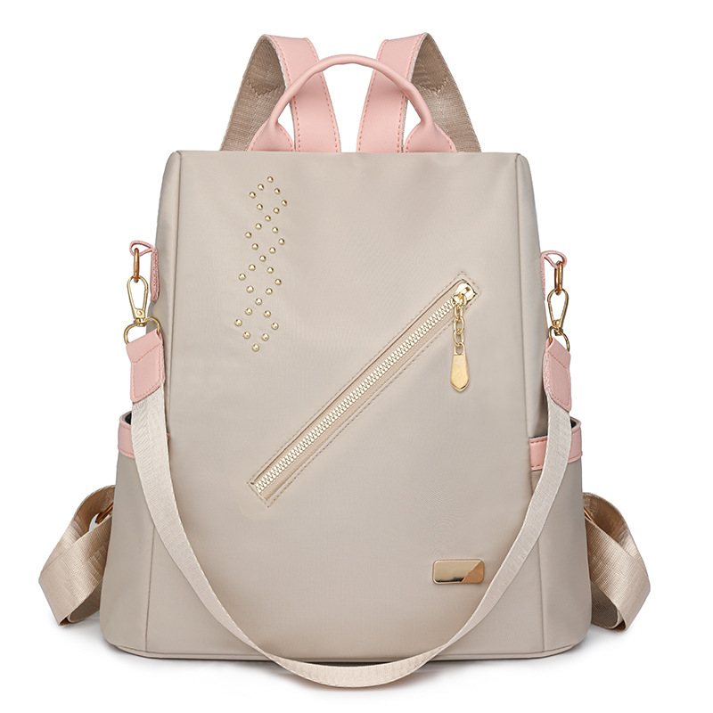 Nuevo estilo remache damas mochila antirrobo moda ligero ocio viajes al aire libre mochila de nailon mochila escolar para estudiantes