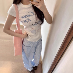 アメリカの甘いギャルの猫の白い肩の半袖のtシャツの女性の夏のかわいい修身はやせて腰の上着の卸売りを収めます。