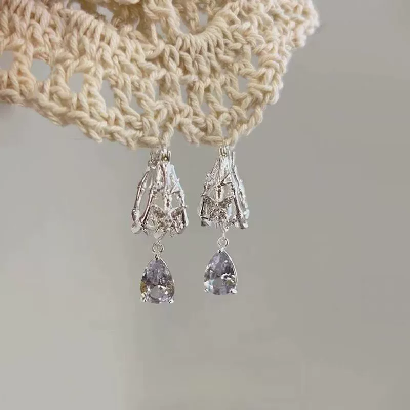 Изысканные сладкие французские полые бабочки капли воды серьги легкие экстравагантные пригородные дикие новые темпераментные серьги оптом