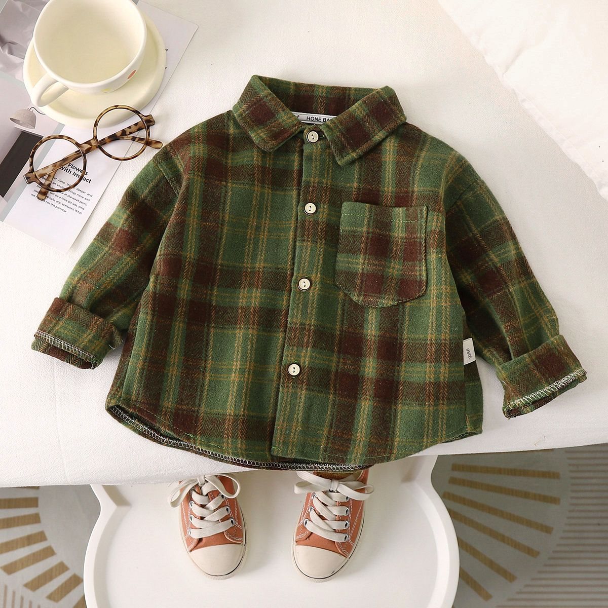 Green colored shirt