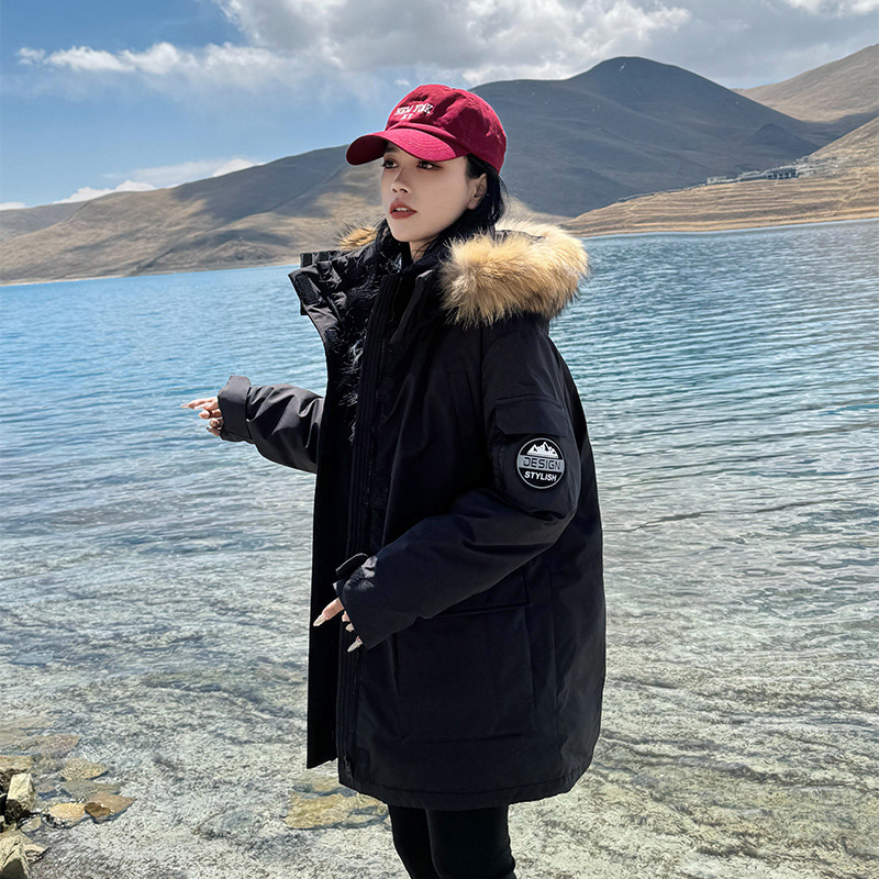 Chaqueta de algodón de pluma para mujeres de invierno 2024 nueva chaqueta de algodón de cuello grande grueso chaqueta de nicho suelta pareja de trabajo para superar