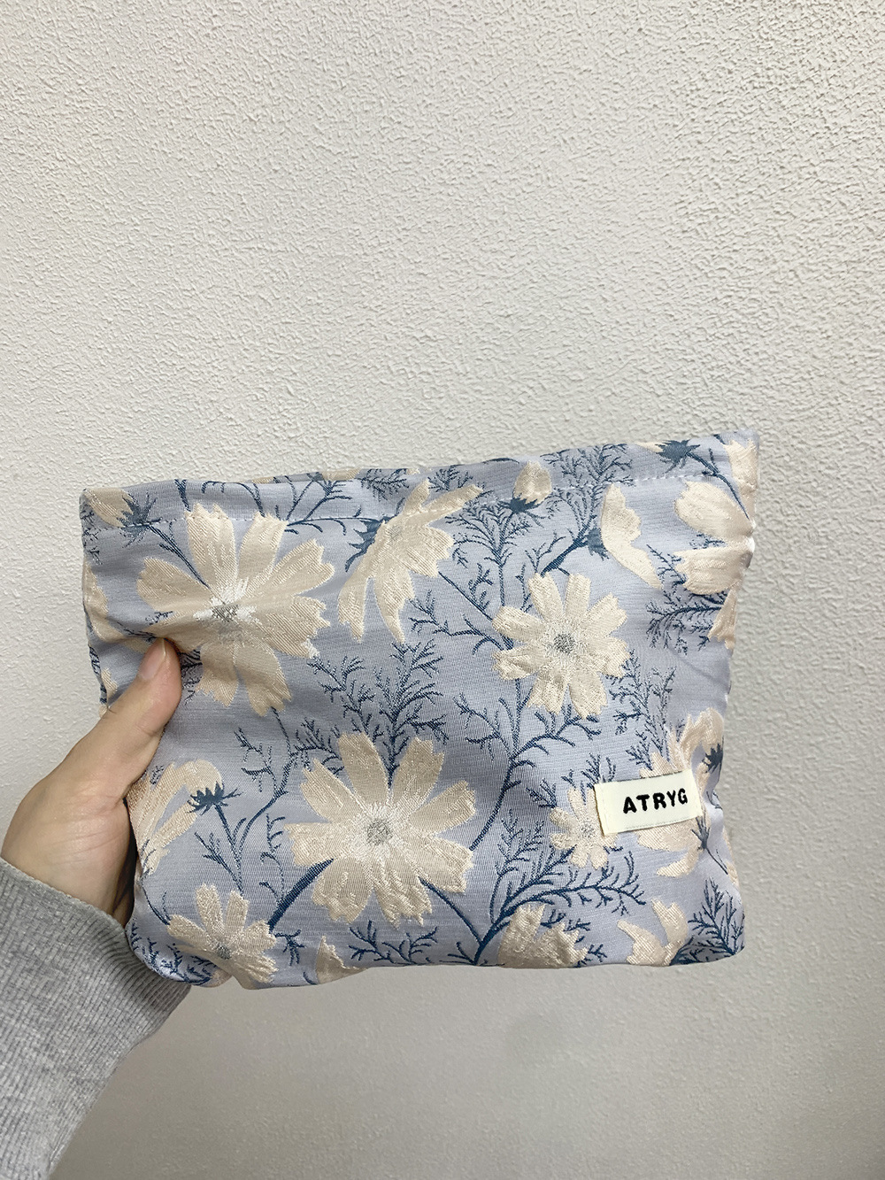 Bolsa de maquillaje una gran cantidad de flores Jacquard tejido Jacquard bolsa de almacenamiento de productos de cuidado de la piel de viaje bolsa de maquillaje portátil