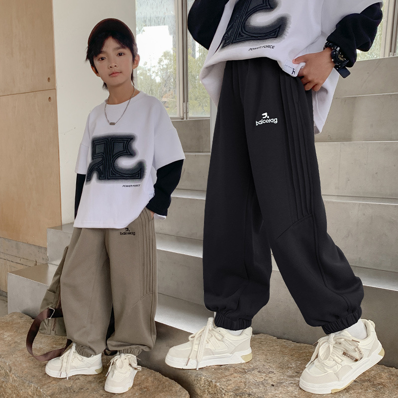 男の子の一体のベルベットのズボンの子供のゆったりした衛ズボン2025の新型の中で子供の秋冬の運動のズボン|undefined