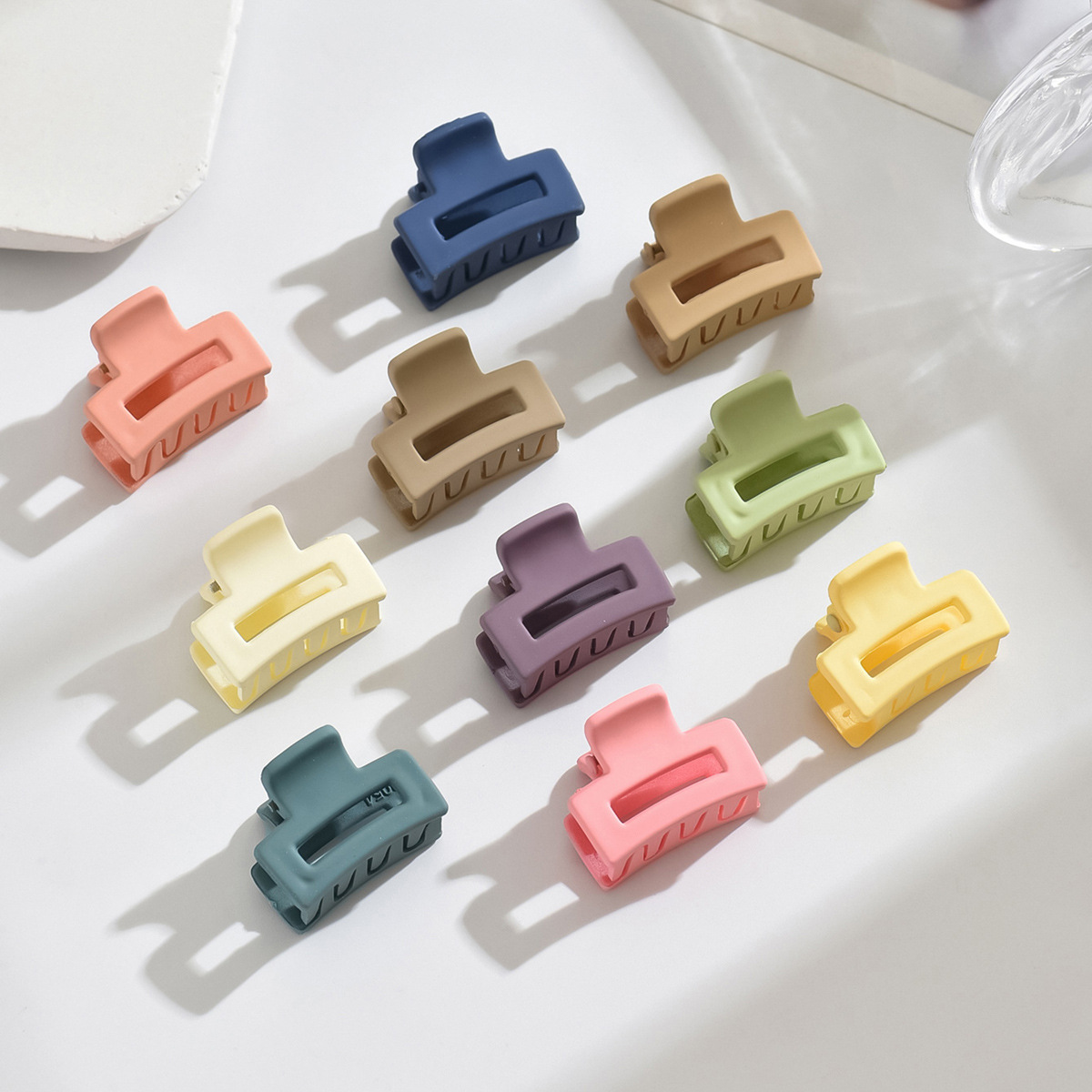 2. 5cm tamaño pequeño mini pinza hueca horquilla cuadrada color caramelo flequillos clip horquilla clip superior Amazon Venta caliente