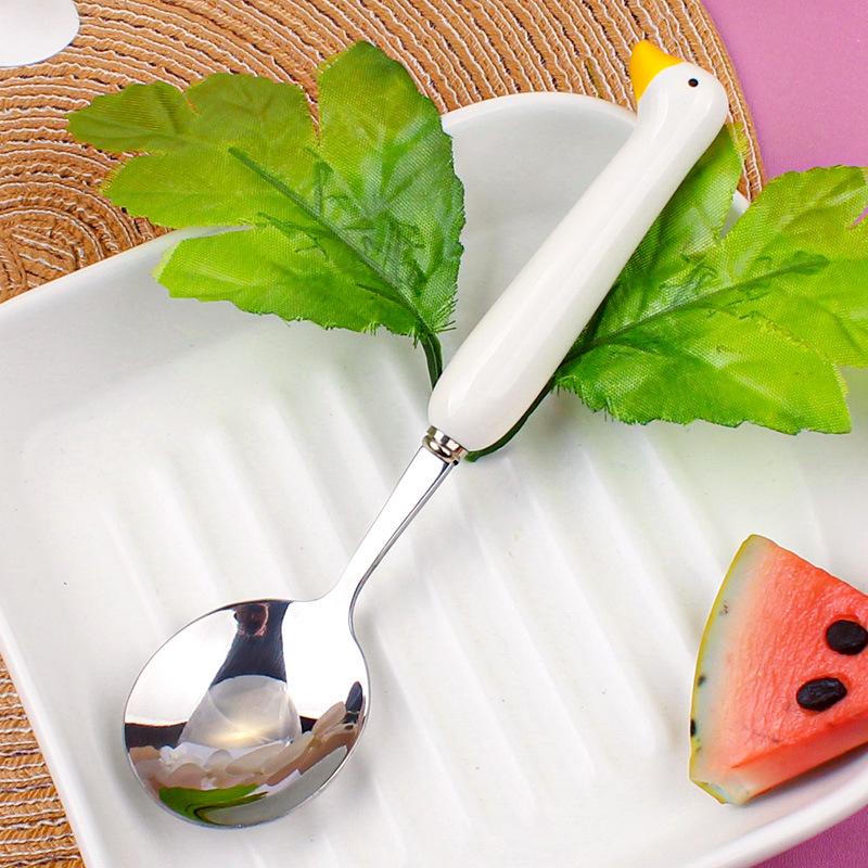 Svanformad sked i rostfritt stål med keramiskt handtag_voghion.com