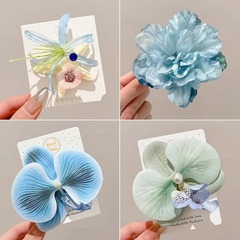 春の雰囲気海辺リゾートスタイル模擬胡蝶蘭の花のヘアピンアクセサリー 2025 新しいヘッドフラワー帽子女性のための