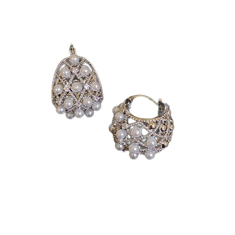 Cuna hueca en forma de U, botones de oreja de perlas, nuevos pendientes de temperamento único, lujo ligero, pendientes de alta gama, sentido del diseño, nicho