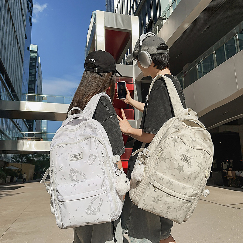 Cross-border 2026 nicho universal estrellas auriculares mochila de gran capacidad mochila de graffiti de viaje de estudiantes universitarios