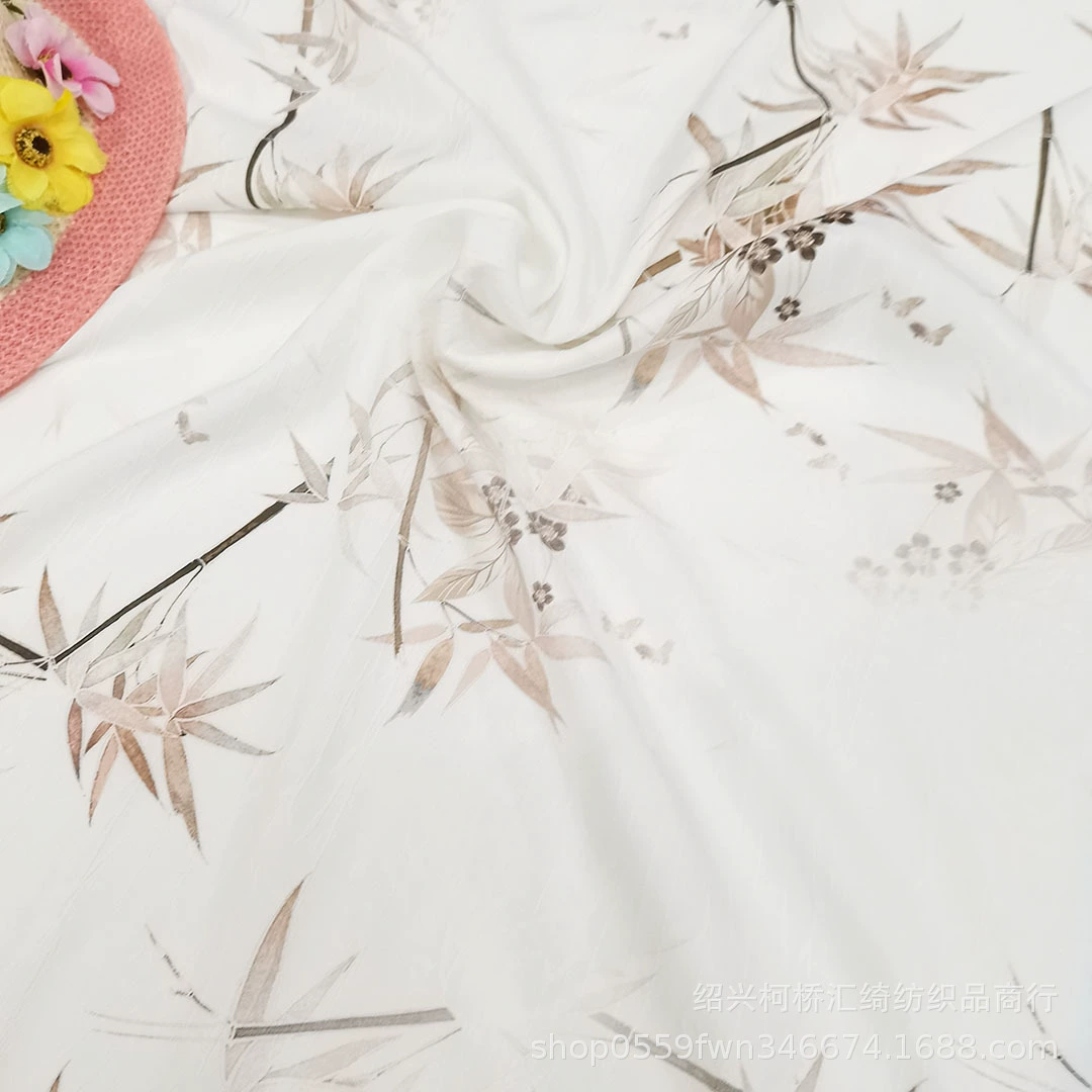 2025 new fabrics, elegant bamboo leaf embossed jacquard fabric, four-sided stretch dark pattern jacquard clothing fabric wholesale