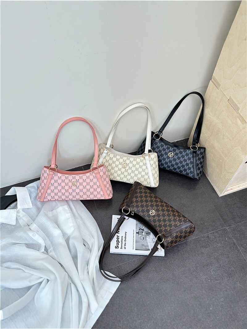 Bolso de mujer 2026 nueva letra impresa bolso de brazo de mujer bolso de hombro de viaje universal bolso de moda simple