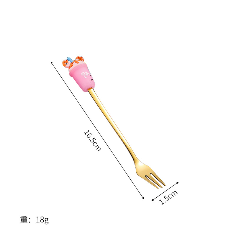 핑크 밀크티 컵과 포크