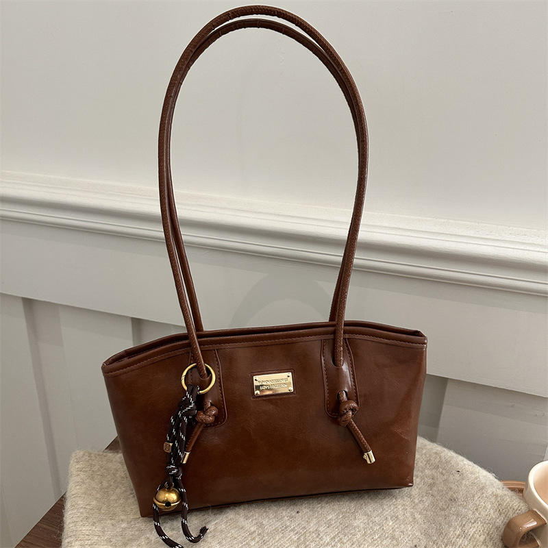 Bagos retro extranjeros para mujeres 2024 nueva moda cera petot bolso de otoño y invierno popular bolsa de hombro de viaje