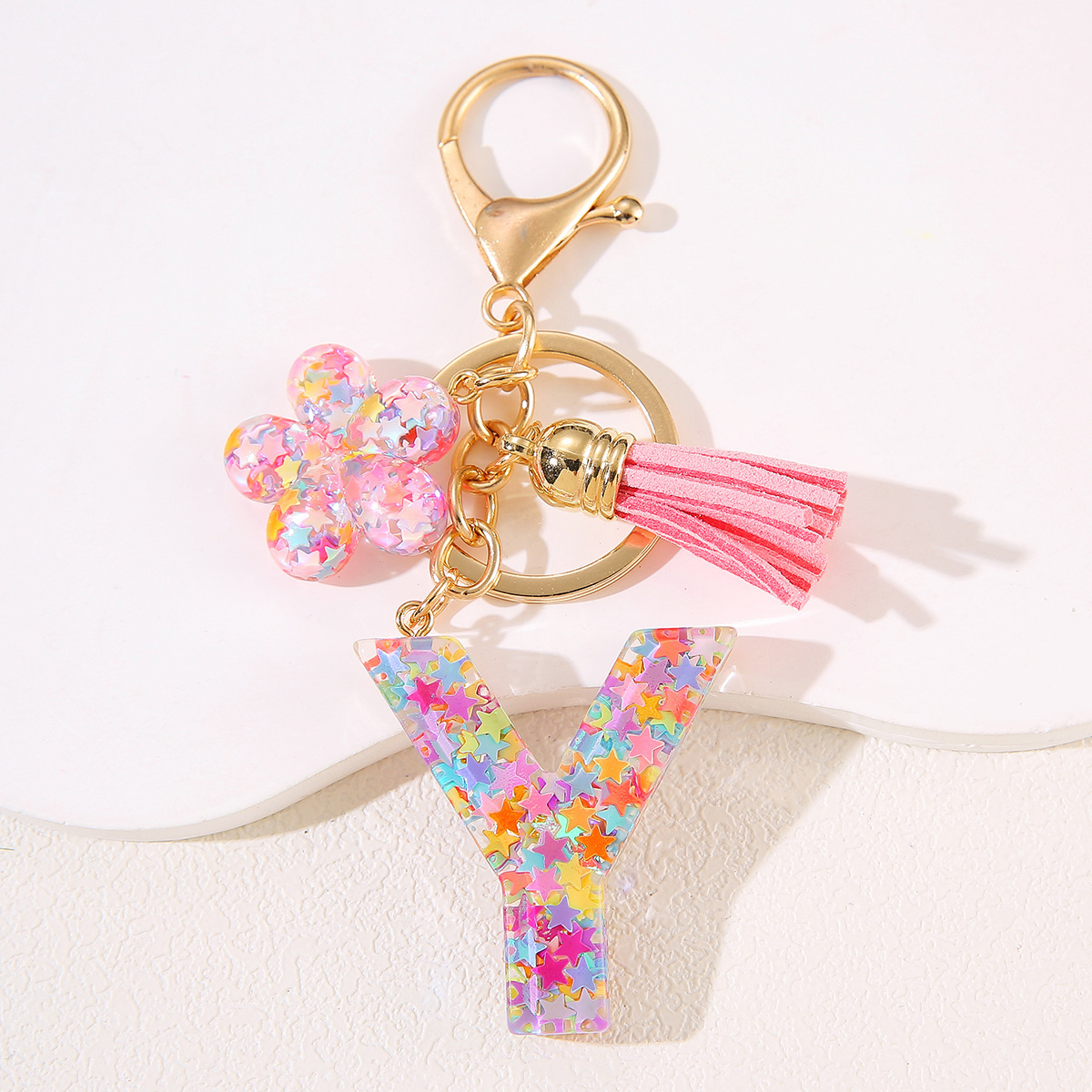 Un nuevo llavero flor de goteo de goma esquinilla 26 letras bolsos colgante llavero accesorios Yiwu