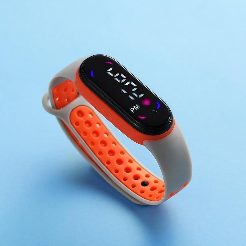 Comercio exterior Venta caliente 50 m natación M7 doble color con LED reloj electrónico niños estudiante deportes impermeable mano táctil