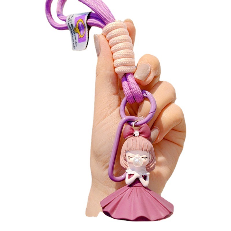 Dibujos animados lindo celebridad en línea corona pequeño elefante volador llavero lindo moda resina muñeca chica llavero bolsa teléfono móvil