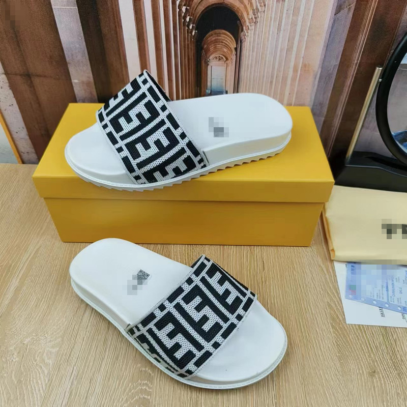 2023 verano nuevo Vietnam Camboya Nigeria sandalias de playa plana bordados hombres y mujeres zapatillas