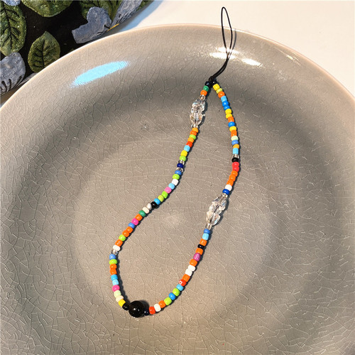 Korean version of the new ins style colorful rice beads beaded mobile phone chain ins fashion bear love flower bow tie pendant for women