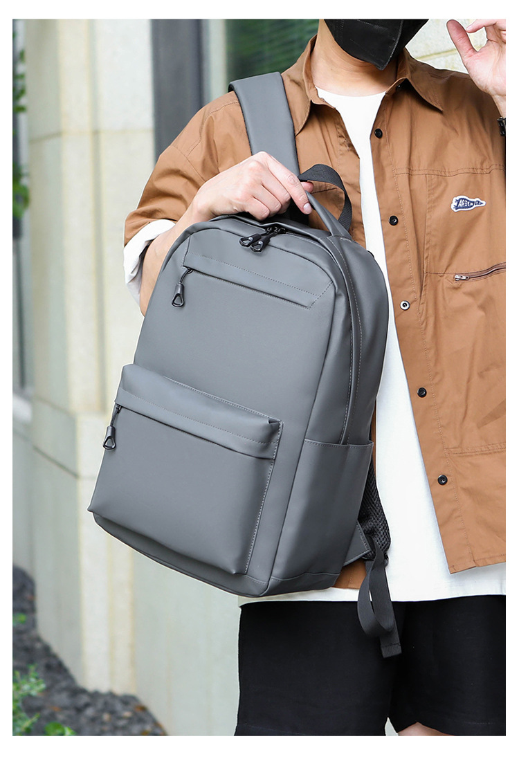 Cross-border wholesale of new large-capacity school bags for junior and senior high school students, foreign trade backpacks, men's Korean version simple commuting computer bags undefined