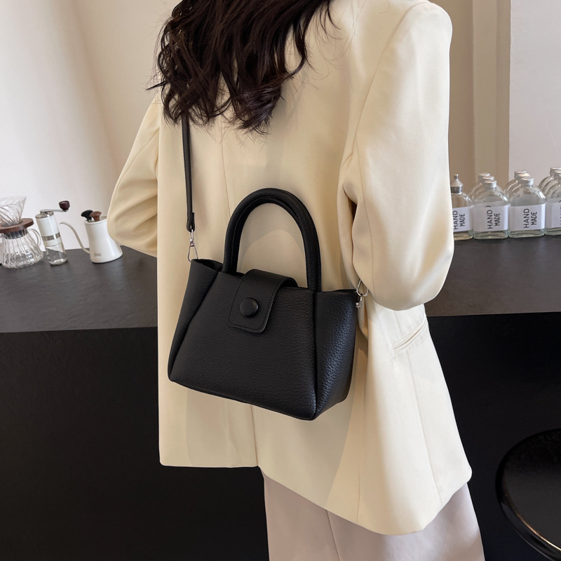 Nicho Zhong bolso de mano simple 2024 nuevo bolso de mujer super caliente bolso de balde de agua casual versátil bolso de tendencia explosiva bolso de mochila