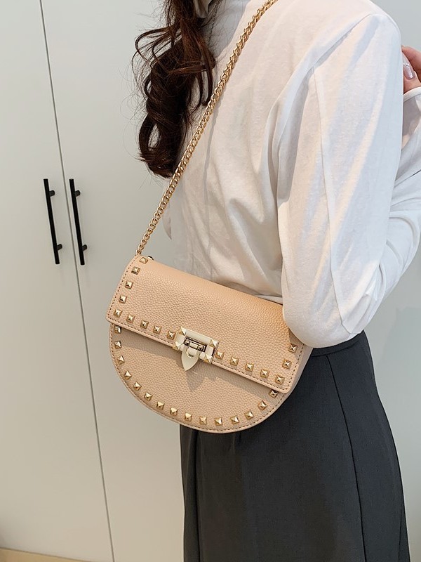 Cross-border 2025 nuevo remaches decoración de color sólido moda multifuncional mochila de hombro con cadenas de bloqueo cinturón de hombro bolsa de sillín
