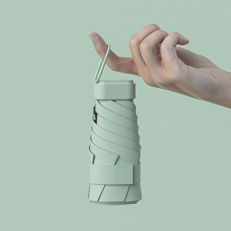 Paraguas de protección solar de vinilo creativo mini paraguas de seis pliegues paraguas de cápsula de bolsillo pequeño para mujer lluvia y lluvia paraguas de sol de doble uso