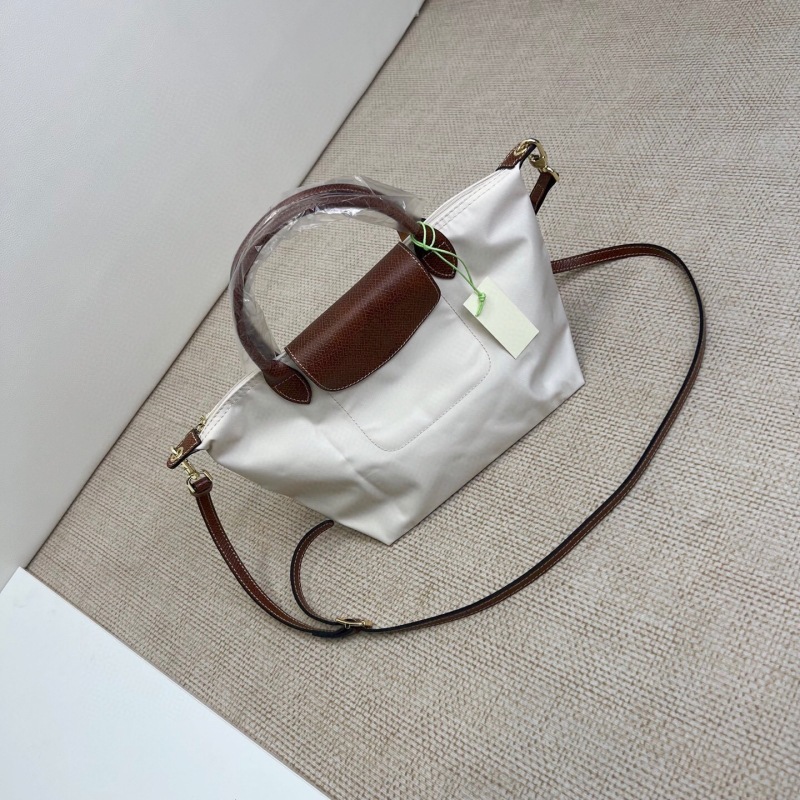 高品質の新しいショートハンドルの小さなハンドバッグ、女性用シングルショルダー、長いストラップ付き、パンチングクロスボディバッグ、ナイロン餃子バッグ|undefined