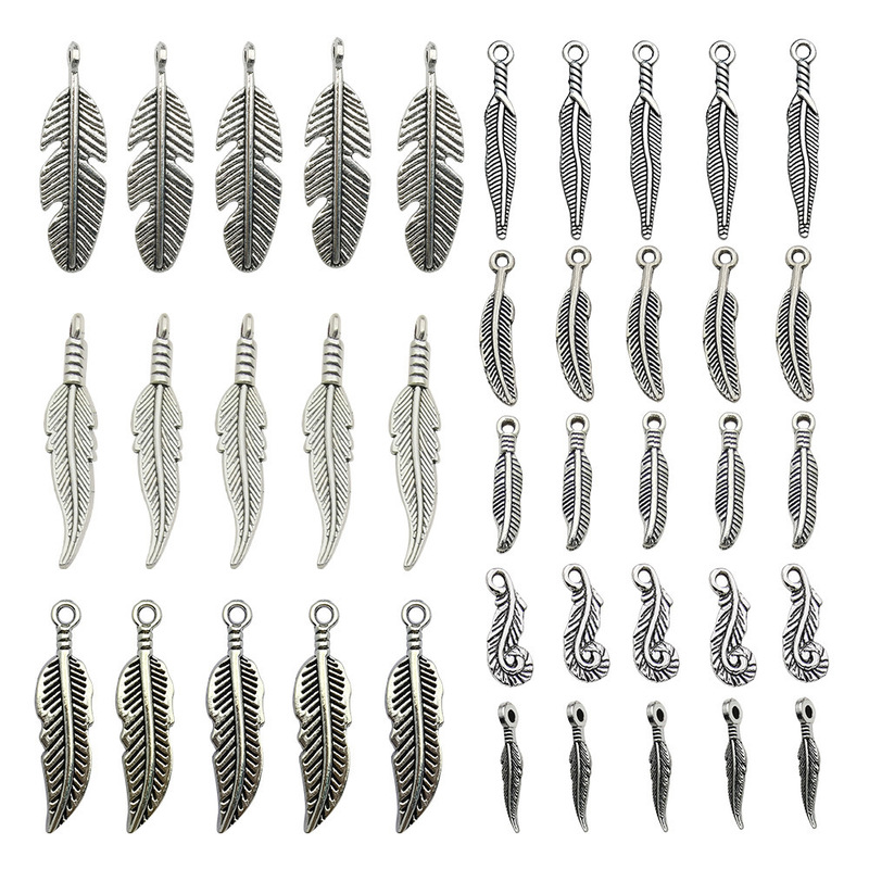Cross-Border Hot Selling Retro Alloy Leaf Feather Necklace Earrings Pendant Pendant DIY Jewelry Accessories Manufacturer Wholesale Cross-Border Hot Selling Retro Alloy Leaf Feather Necklace Earrings Pendant Pendant DIY Jewelry Accessories Manufacturer Wholesale
