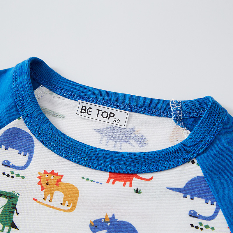 Muestra personalizada 2025 nueva ropa infantil de cuello redondo dibujos animados impresos dinosaurios niños manga de verano algodón delgado