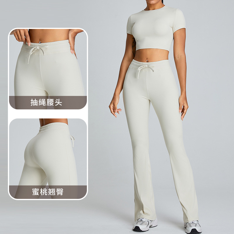 Otoño nuevo pull-up yoga pantalones de micro-ampliación para mujeres abdominales de elevación de caderas y pantalones de tenedor para adelgazar pantalones deportivos al aire libre