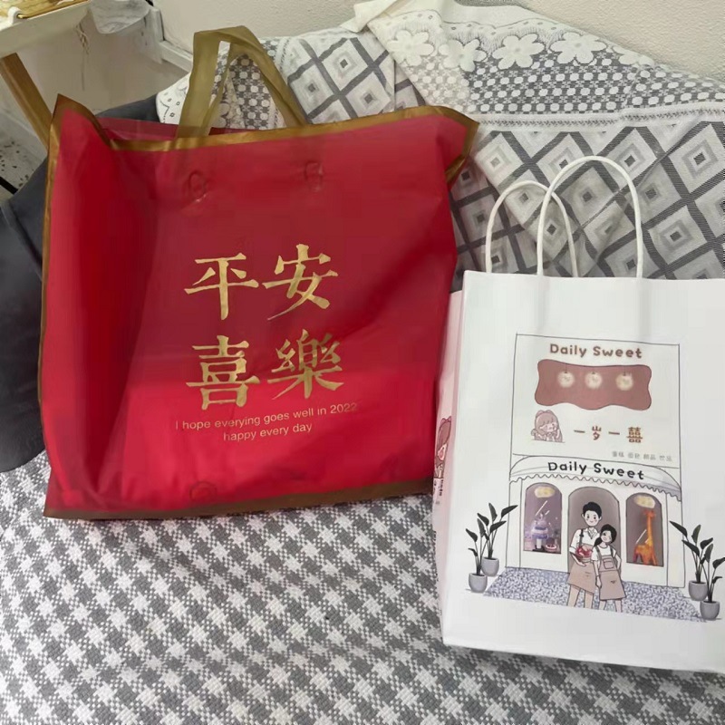 节日喜庆磨砂手提袋子男女童装店装衣服塑料袋礼品服装店袋子