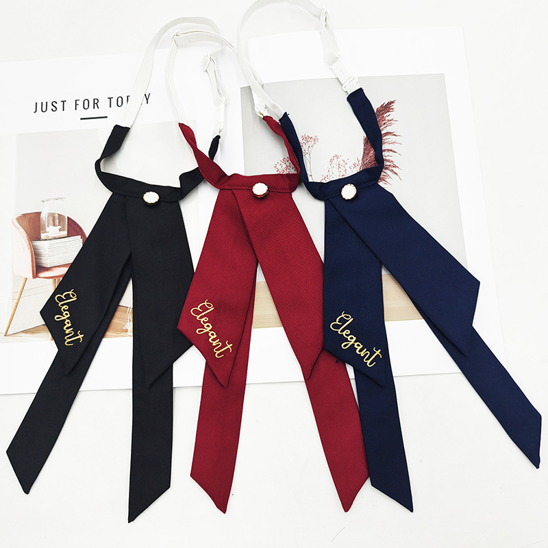 Fabricante spot color sólido jk pajarita versión coreana femenina estilo universitario arco foto de graduación traje de soltero bordado cuello flor serpentina