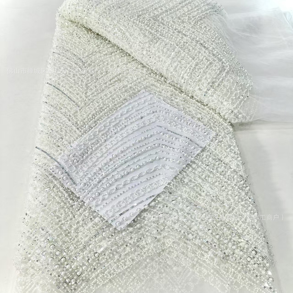 Tejido bordado Gao Ding perla vestido de moda cadena de perlas vestido fabricantes de tela al por mayor