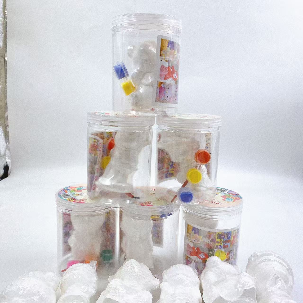 Juguetes para niños pintados muñecas de yeso tridimensionales DIY pintadas a mano barril puzzle graffiti creativo 2 yuan al por mayor