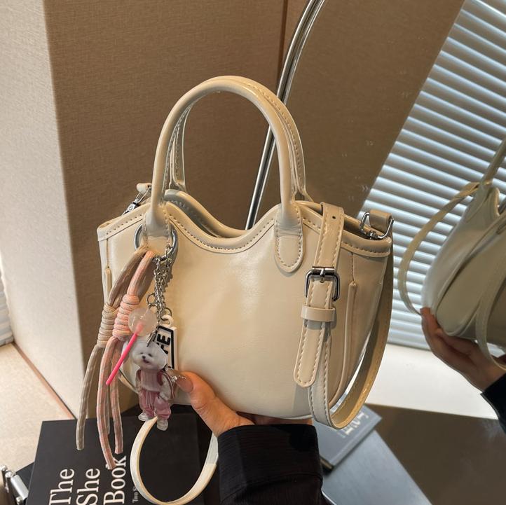 Bolso de tendencia extranjera, bolso de mano de mujer 2025, nuevo estilo de moda, bolso de cubo de hombro casual, mochila de textura de alta calidad