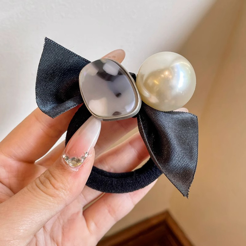 Arco negro perla anillo de cabello de alta sensibilidad de alta elasticidad banda de goma para mujeres atado cabello 2025 nuevo accesorio de cabello de cuerda de cabeza