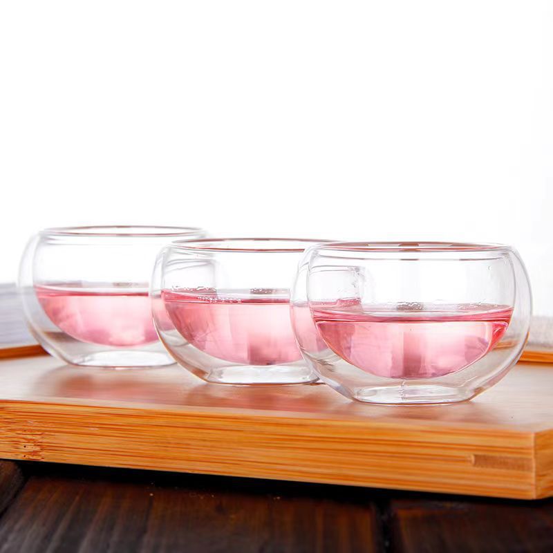 Taza de vidrio simple transparente resistente al calor Taza de agua aislante de silicio Taza de té Kung Fu Taza de té en el hogar