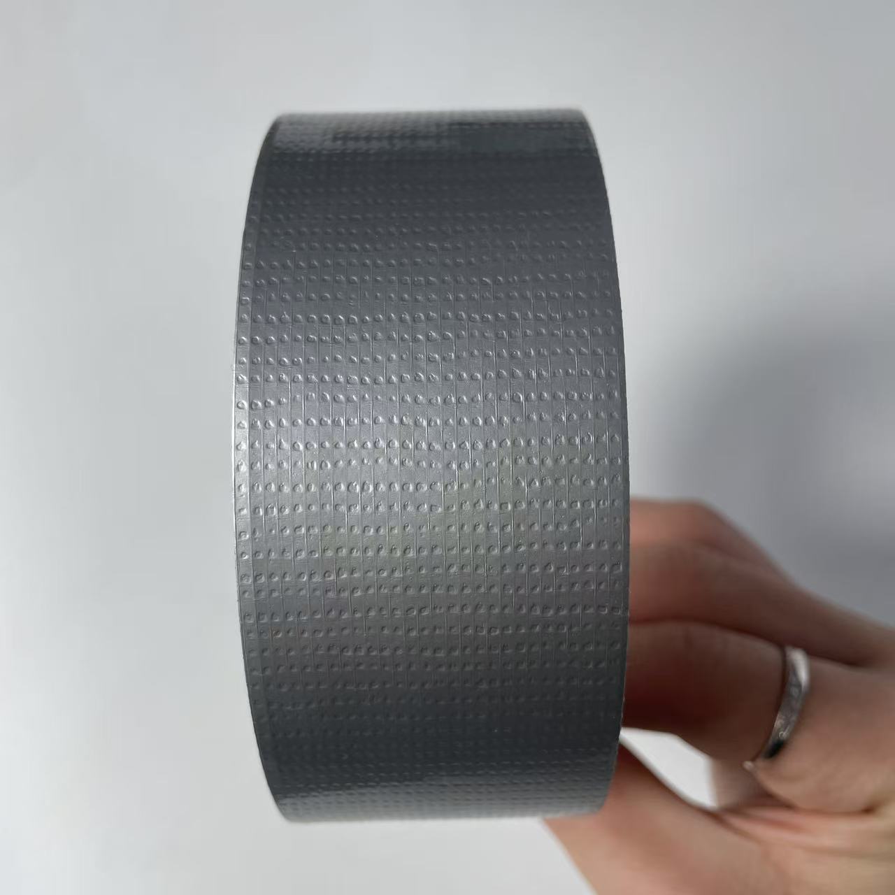 Tape adhesiva de tela de alta viscosidad decoración sin rastro película adhesiva de tela de malla adhesiva de tela unilateral cinta adhesiva de tela